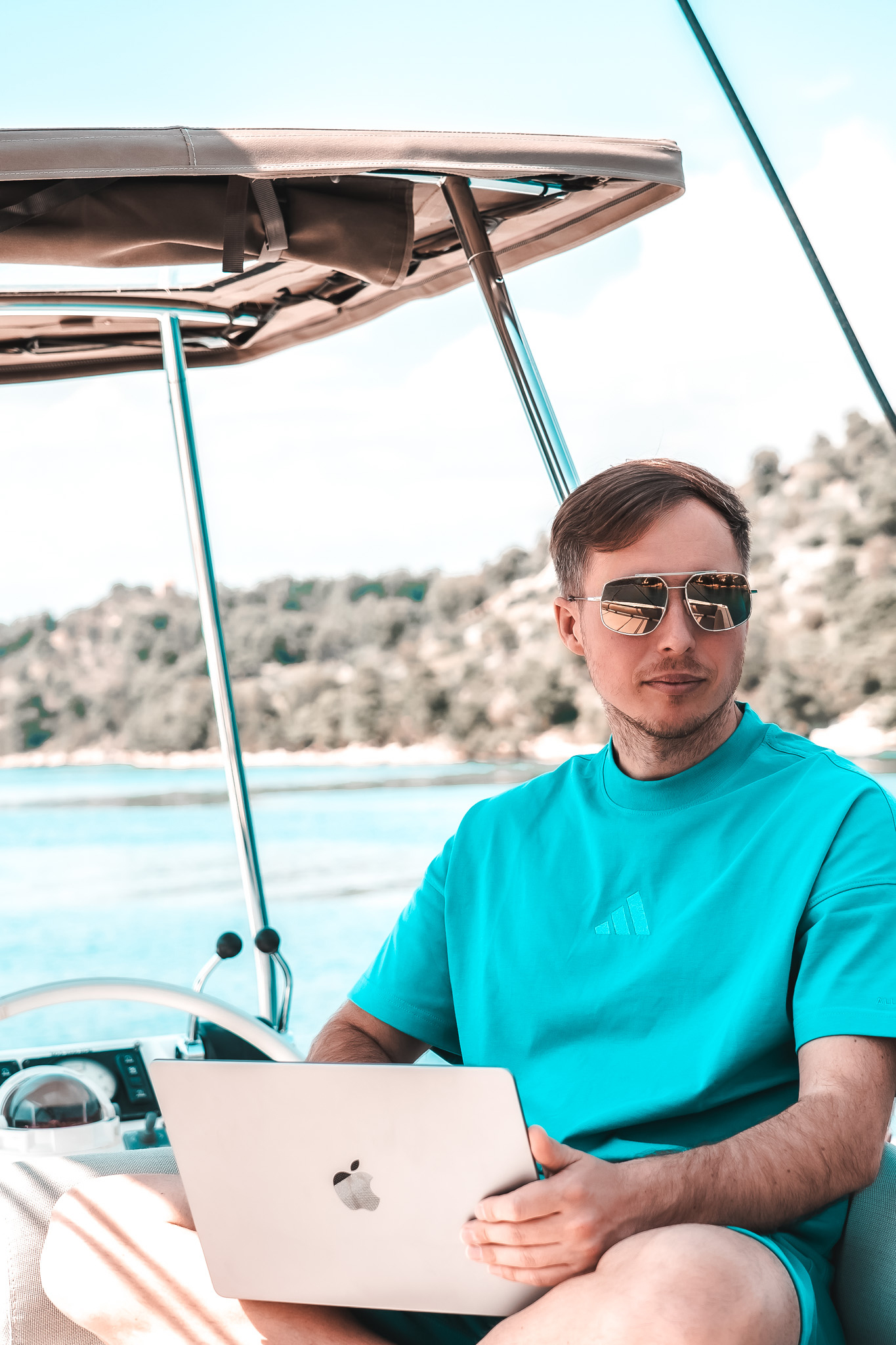 The office: a laptop, a connection, and the open water.